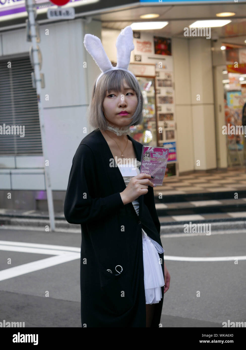 JAPAN - photo by Sean Sprague  Akihabara, Tokyo, by night. Prostitutes dressed as maids or other costumes. 'cos play'. Stock Photo