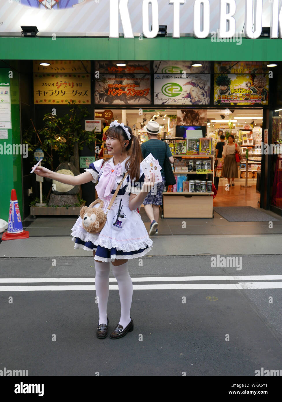 JAPAN - photo by Sean Sprague  Akihabara, Tokyo, by night. Prostitutes dressed as maids or other costumes. 'cos play'. Stock Photo