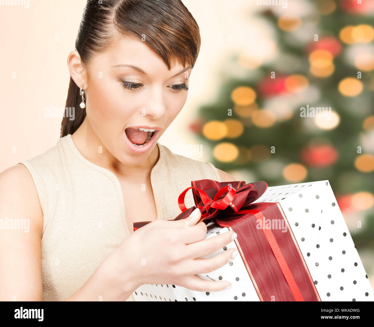 celebration, holidays, xmas concept - happy woman with gift box Stock ...