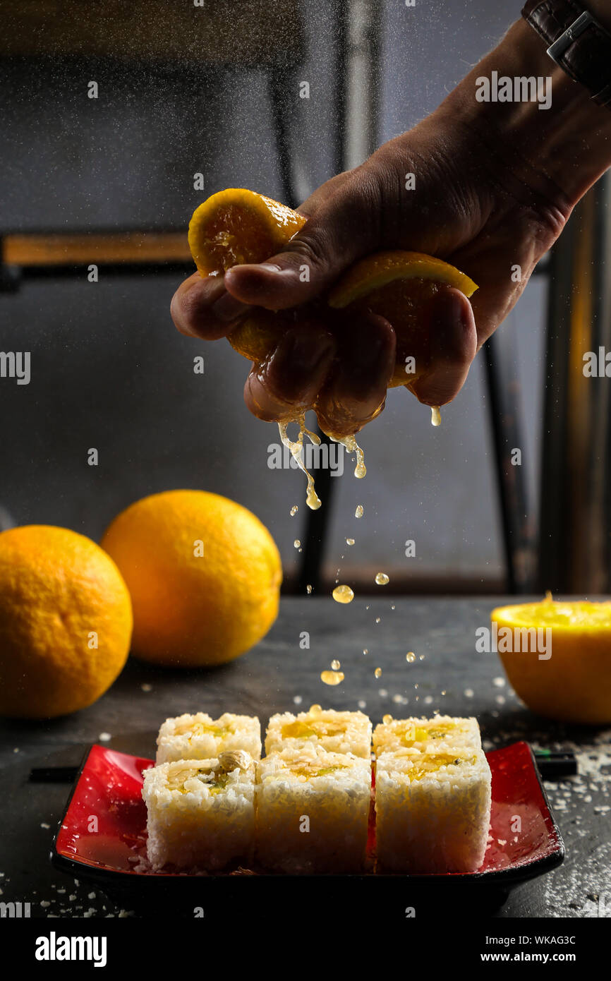 Hand crushing fruit hires stock photography and images Alamy