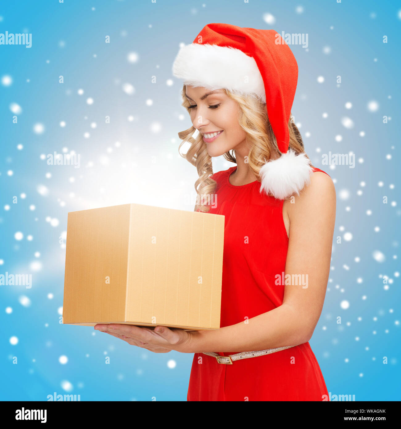 christmas, x-mas, new year, winter, happiness concept - smiling woman ...