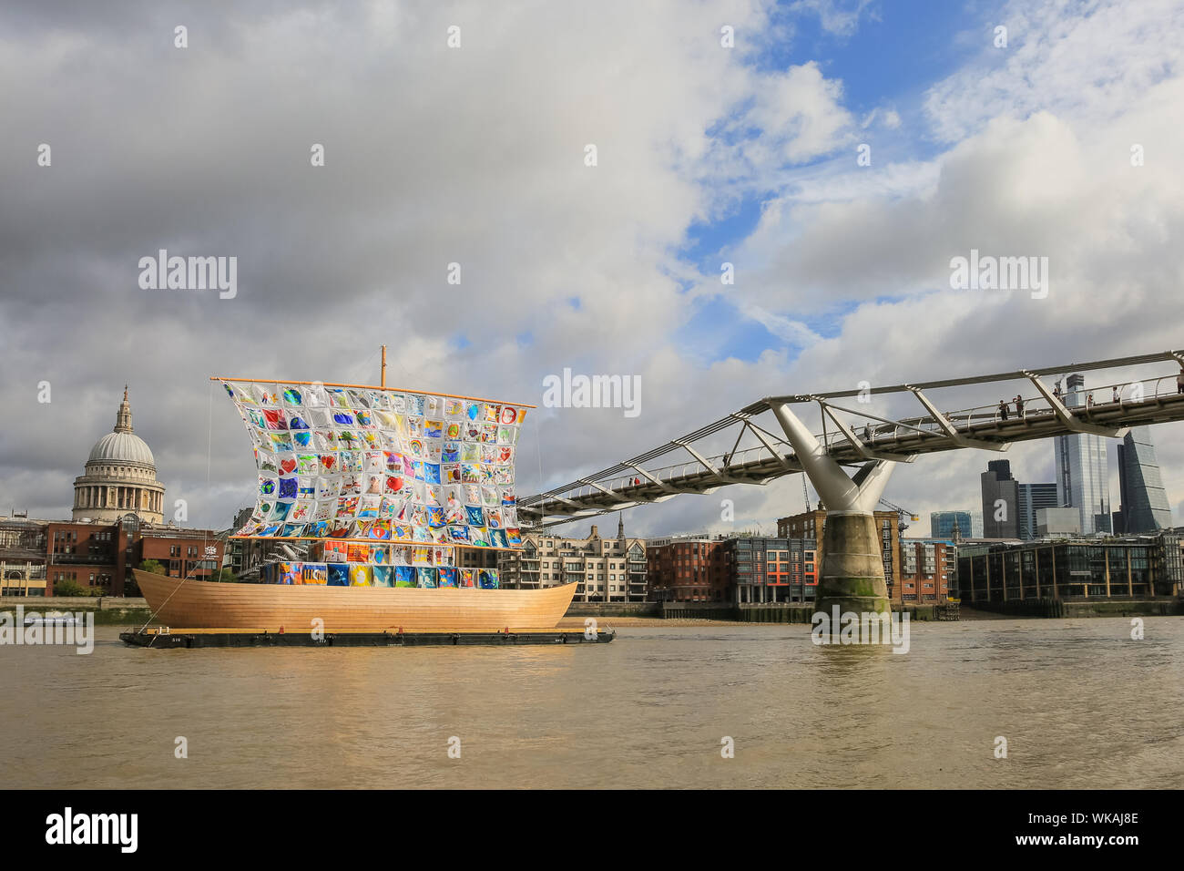 Westminster, London, 04th Sep 2019. Part of Totally Thames festival, the Ship of Tolerance is a beautiful 60-foot wooden boat installation on the River Thames at Tate Modern, with the artworks of children from around the world weaved together to create its sails. Promoting unity and encouraging tolerance, the ship becomes a beacon of acceptance and diversity. It was created by artists Ilya and Emilia Kabakov. Credit: Imageplotter/Alamy Live News Stock Photo