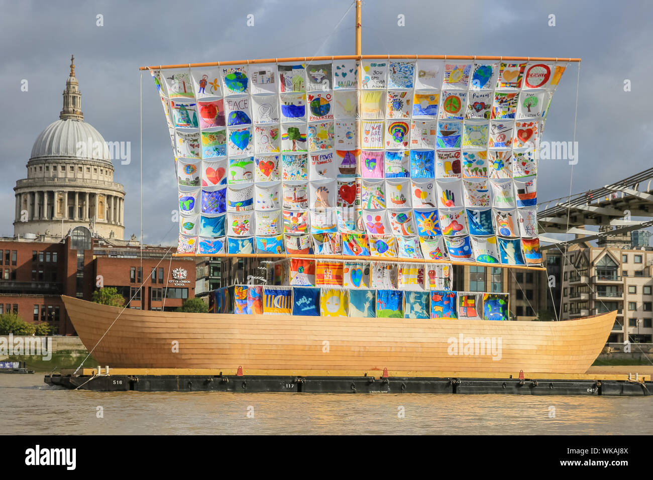 Westminster, London, 04th Sep 2019. Part of Totally Thames festival, the Ship of Tolerance is a beautiful 60-foot wooden boat installation on the River Thames at Tate Modern, with the artworks of children from around the world weaved together to create its sails. Promoting unity and encouraging tolerance, the ship becomes a beacon of acceptance and diversity. It was created by artists Ilya and Emilia Kabakov. Credit: Imageplotter/Alamy Live News Stock Photo