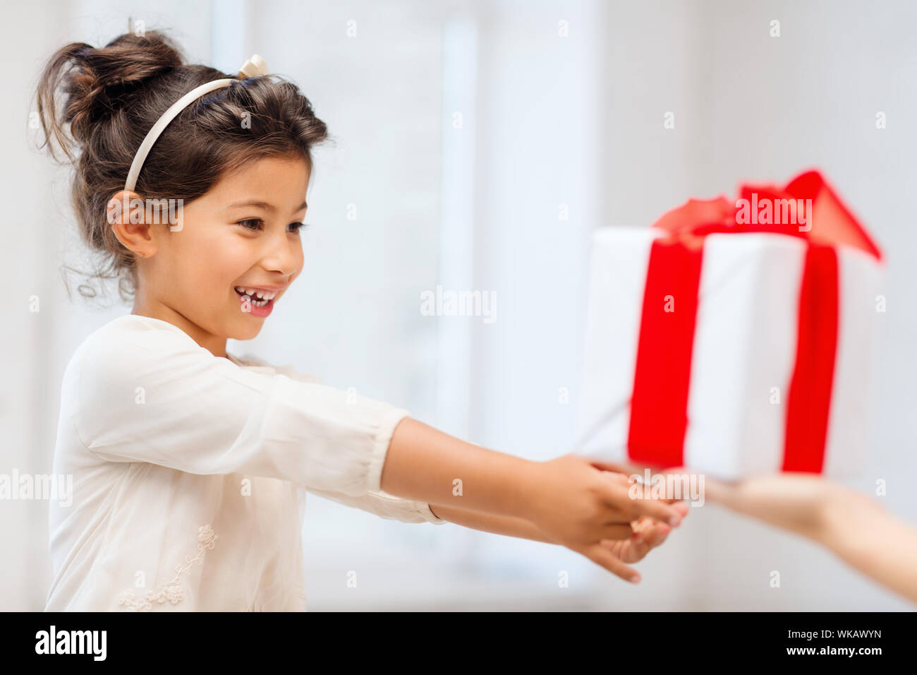 holidays, presents, christmas, x-mas, birthday concept - happy child ...