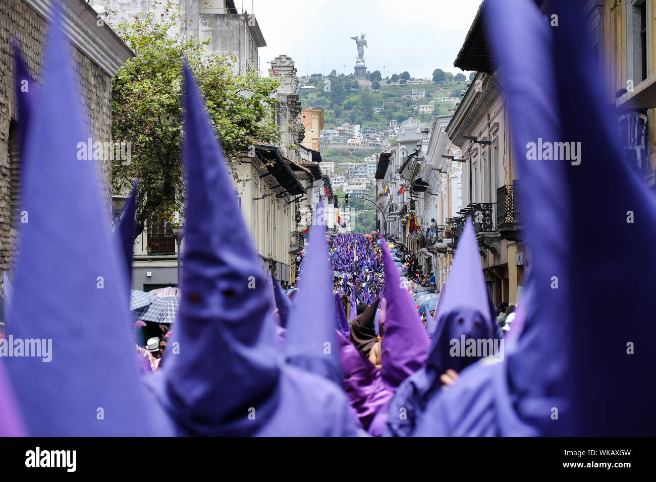 The cucuruchos of Ecuador walk the historic streets of Quito in their