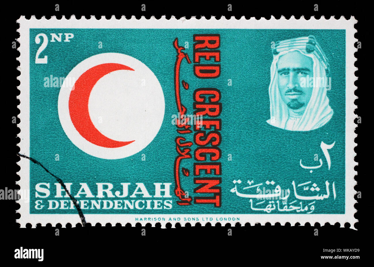 Stamp issued in the Sharjah shows Red Crescent Emblem, portrait of Sheik Saqr bin Sultan al Qasimi, 100 years International Red Cross, circa 1963. Stock Photo
