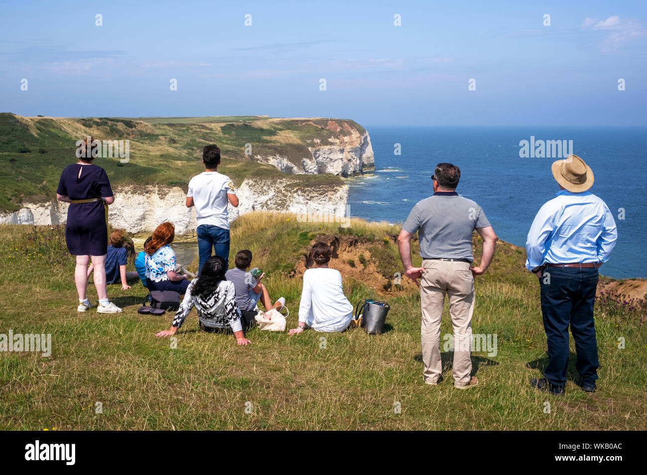 Focussed attention on a flying object (drone) above Flamborough Head, Yorkshire, UK Stock Photo