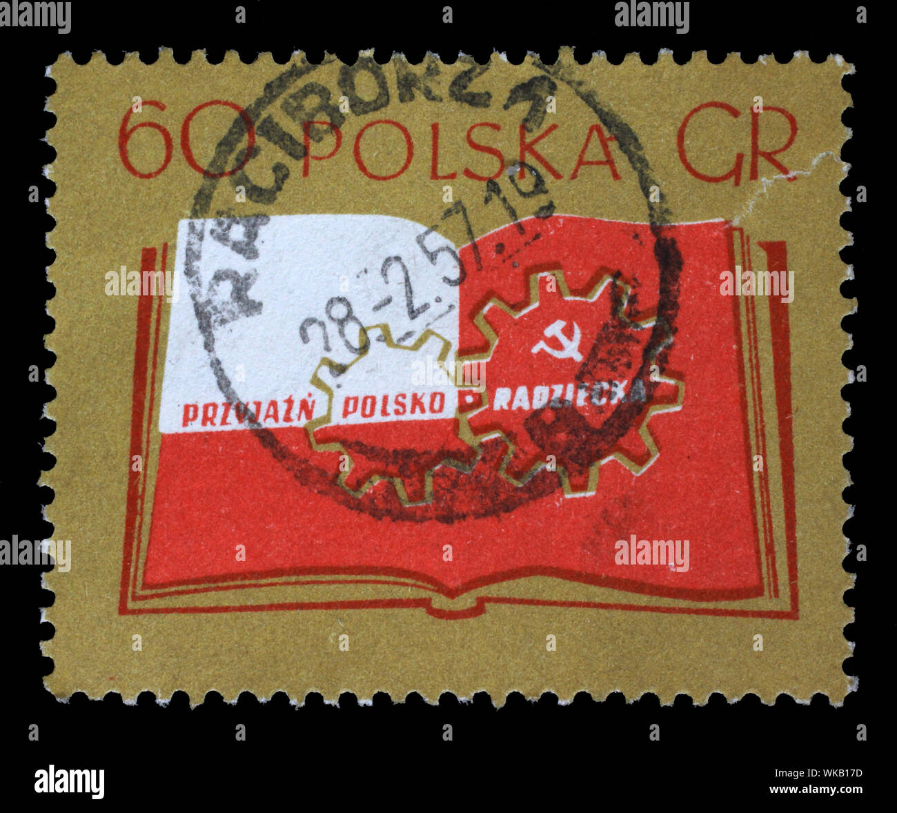 Stamp printed in Poland shows Open book and cogwheels, Polish-Soviet friendship, circa 1956. Stock Photo