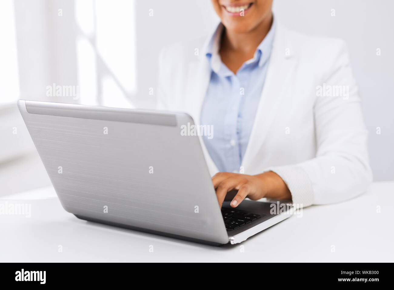businesswoman using her laptop computer Stock Photo