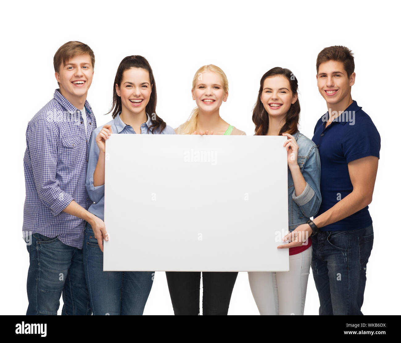 group of standing students with blank white board Stock Photo - Alamy