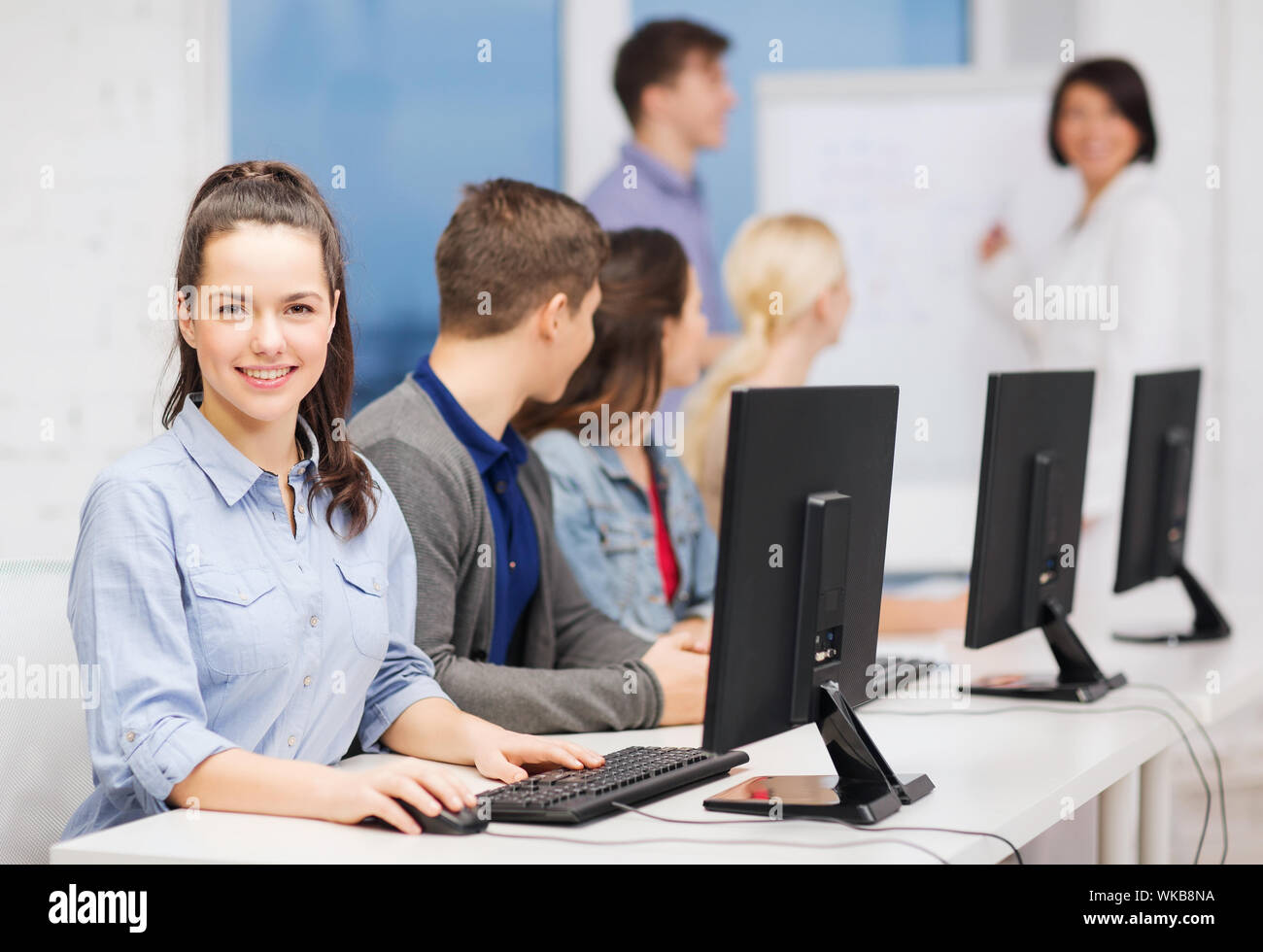 students with computer monitor at school Stock Photo Alamy