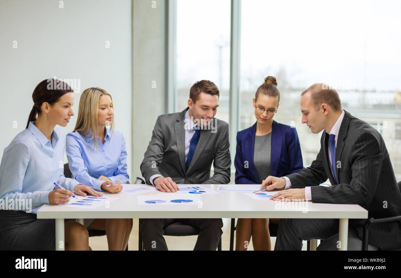 business team with documents having discussion Stock Photo