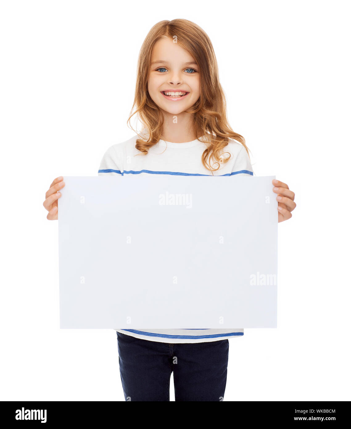 smiling little child holding blank white paper Stock Photo - Alamy