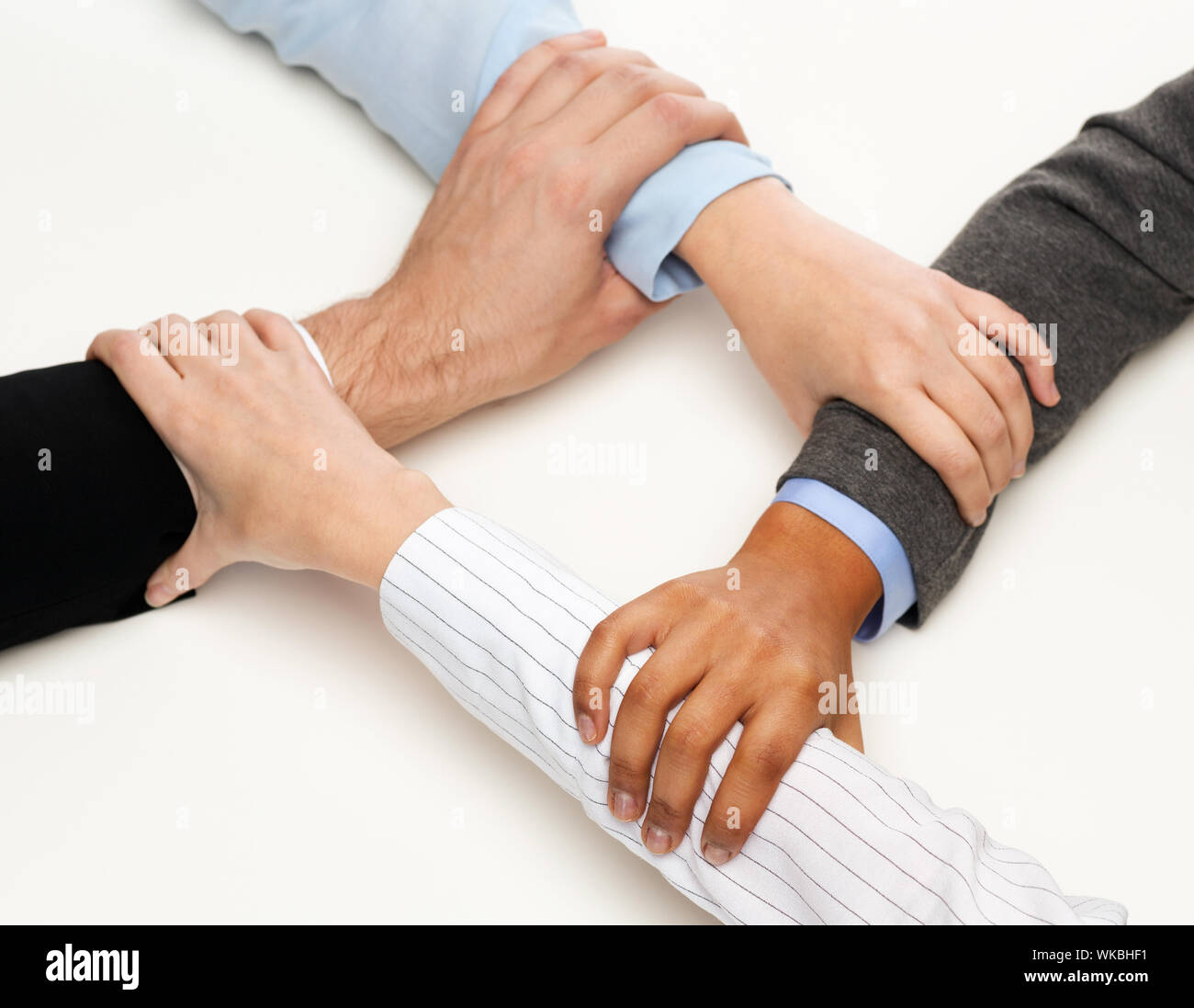 business and teamwork concept - closeup of businesspeople hands united Stock Photo