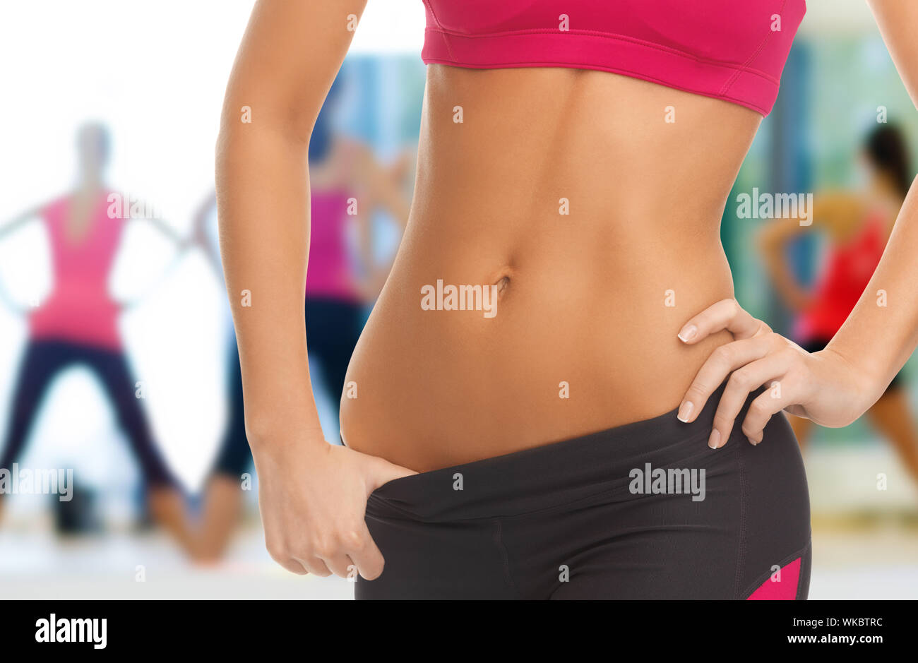 Woman trained abs hi-res stock photography and images - Alamy