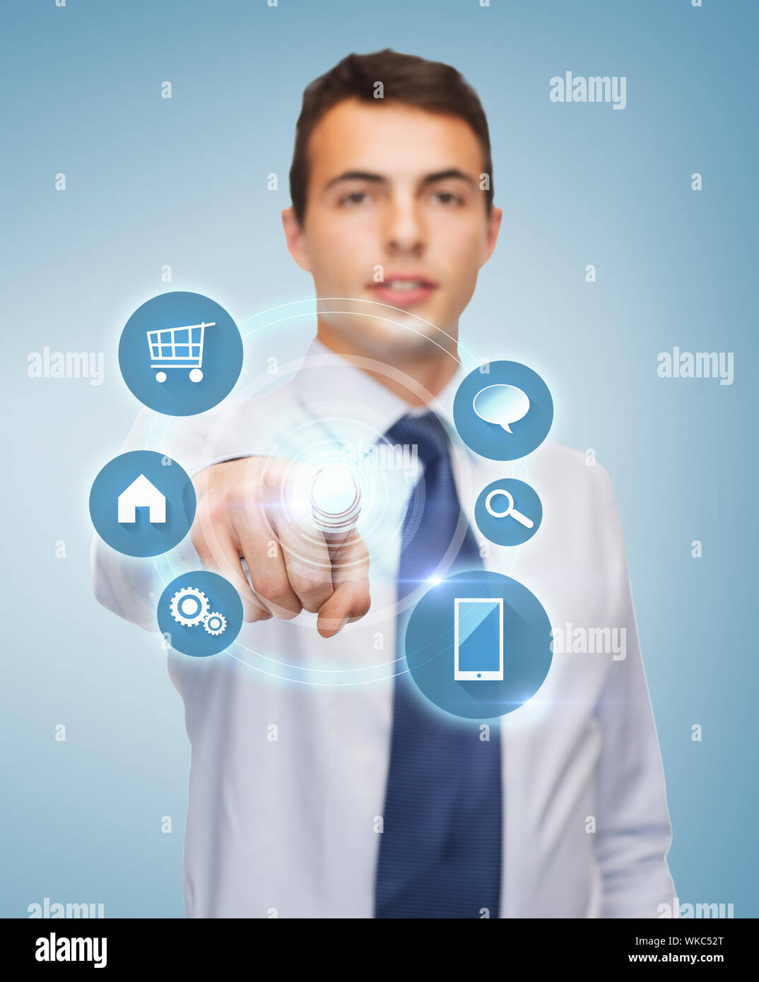 buisnessman pointing finger to virtual screen Stock Photo