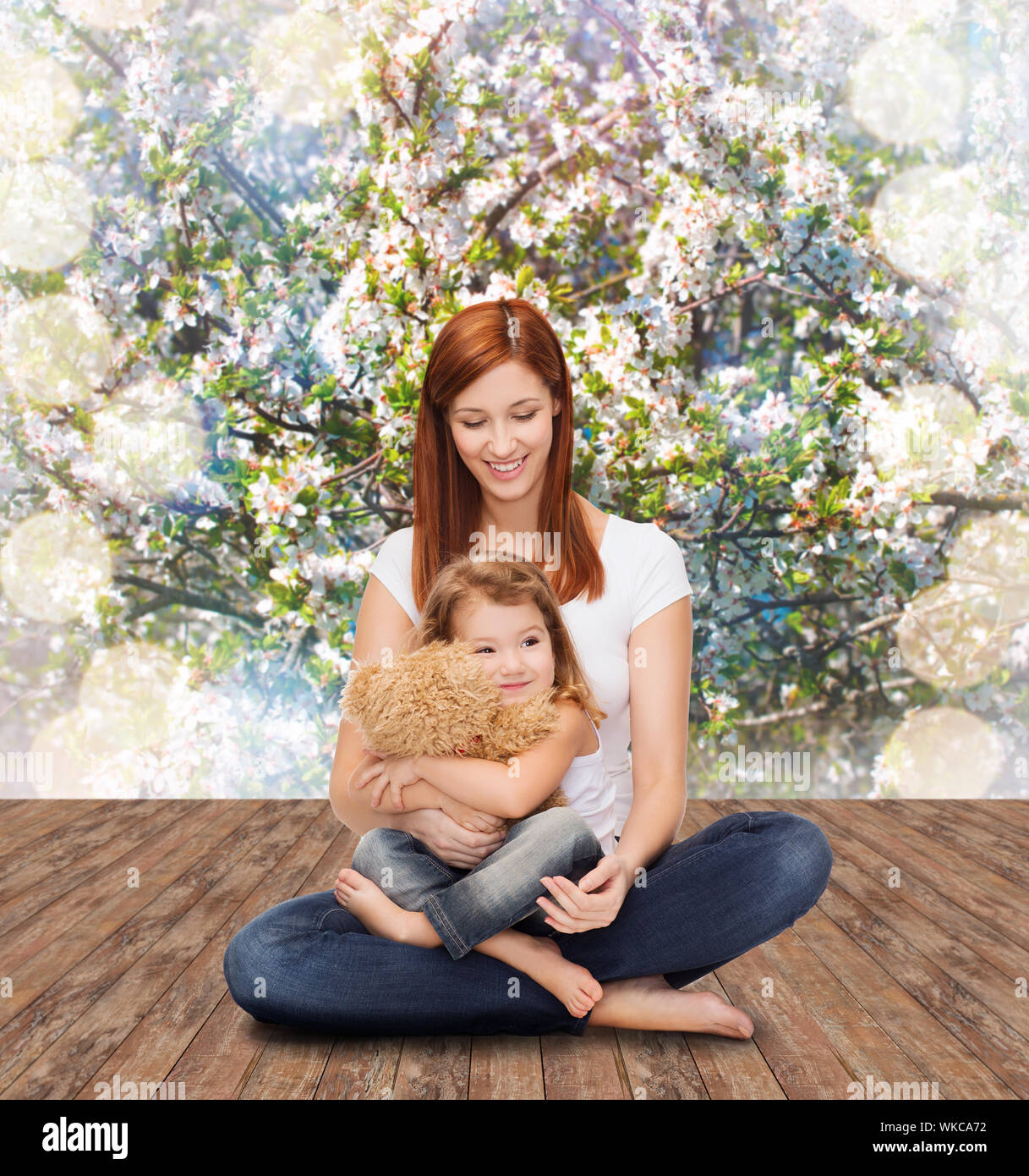 happy mother with adorable girl and teddy bear Stock Photo - Alamy