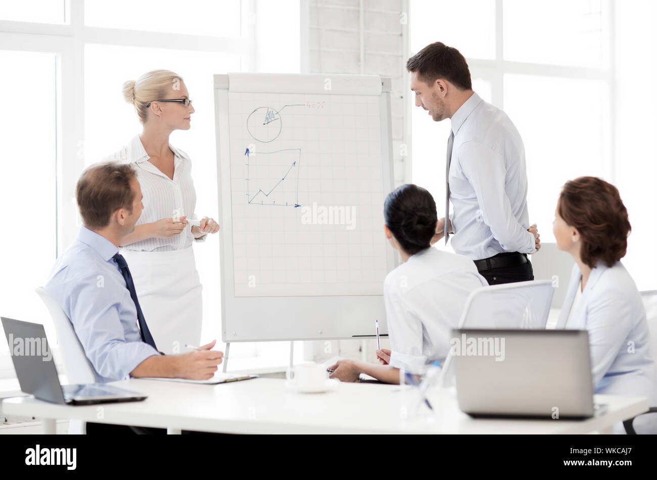business team discussing something in office Stock Photo