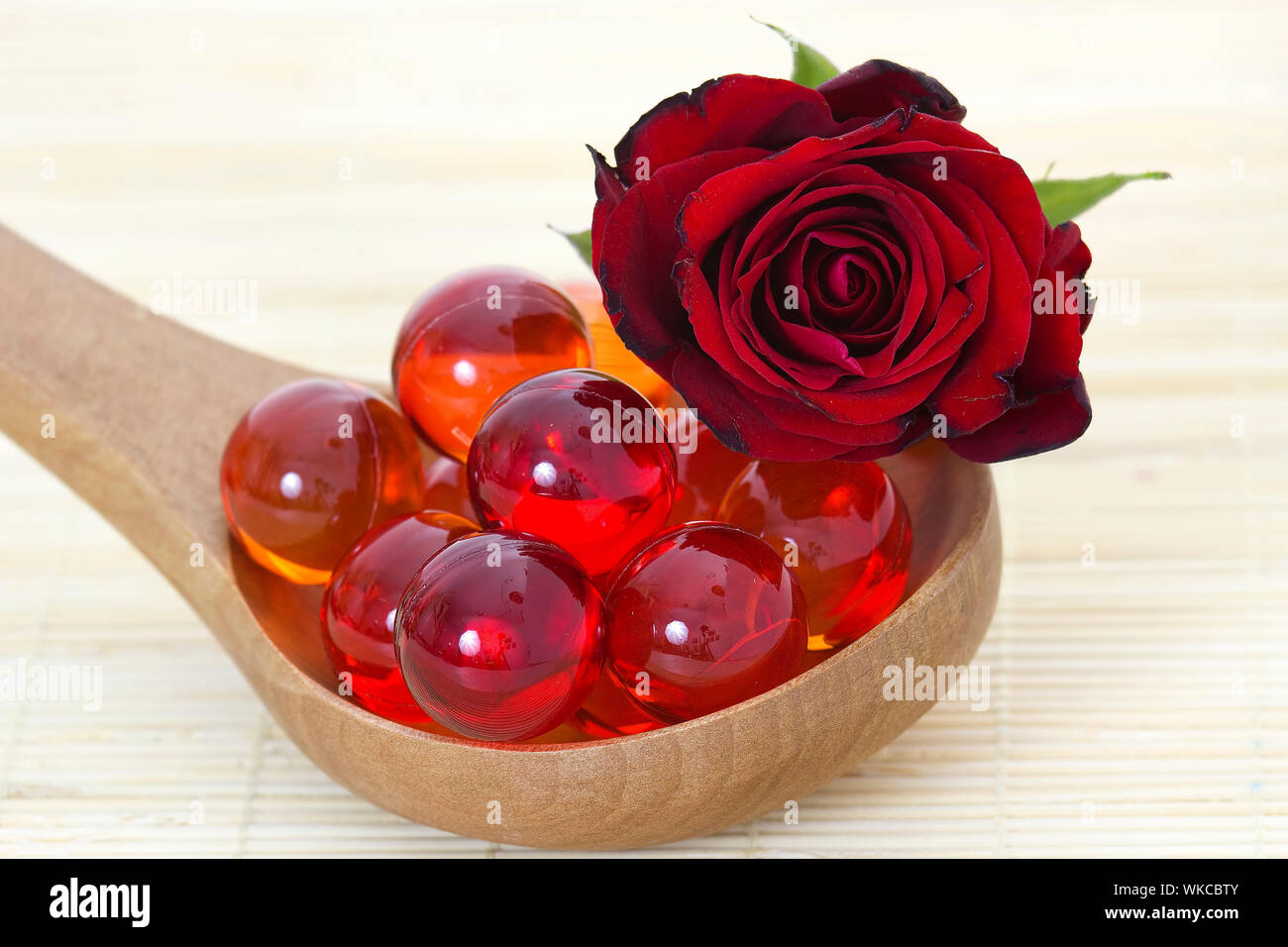 oil bath pearls and fresh rose Stock Photo Alamy