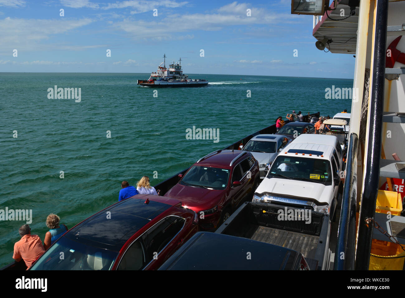 The Car Ferry W Stanford White passes the Roanoke packed with cars and