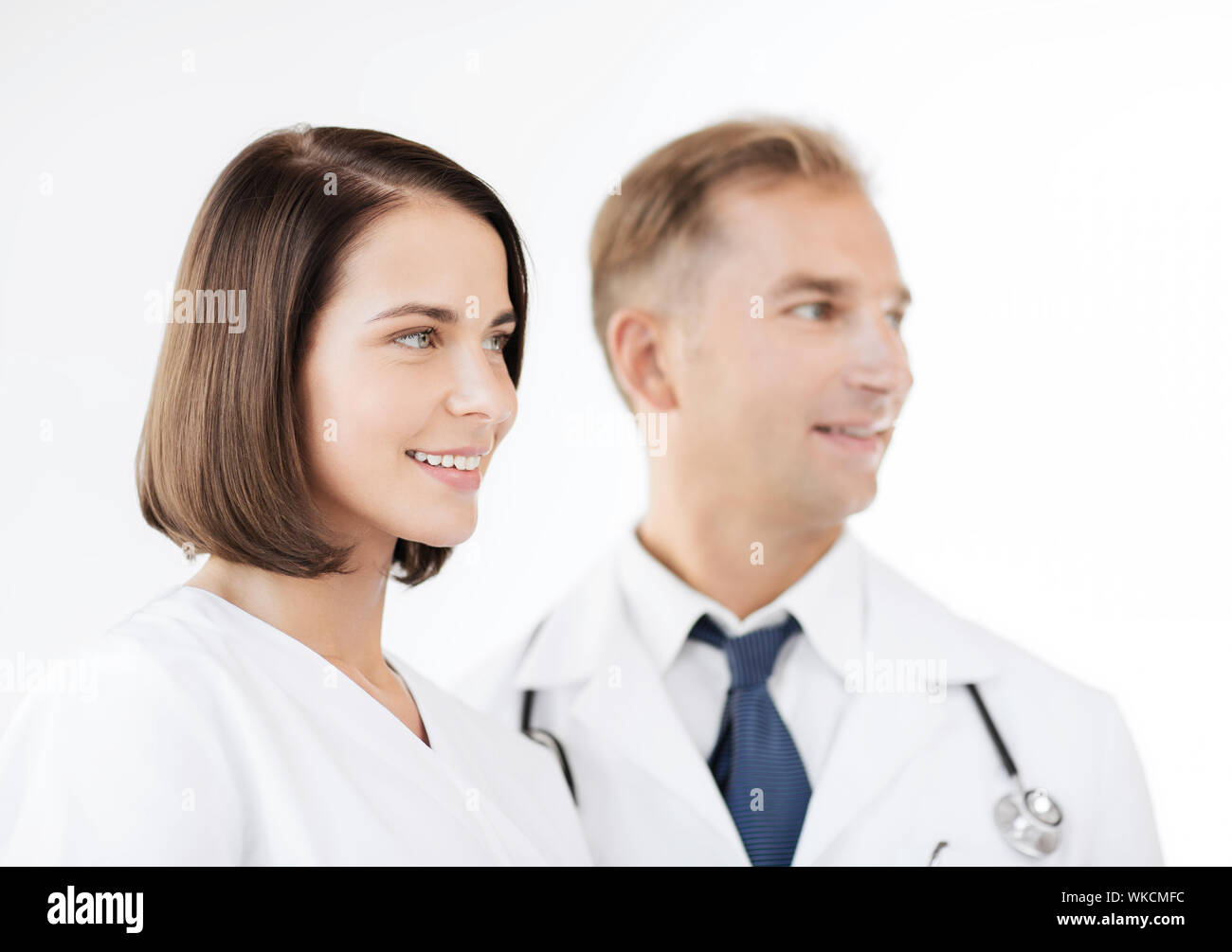 healthcare and medical concept two doctors with stethoscopes Stock