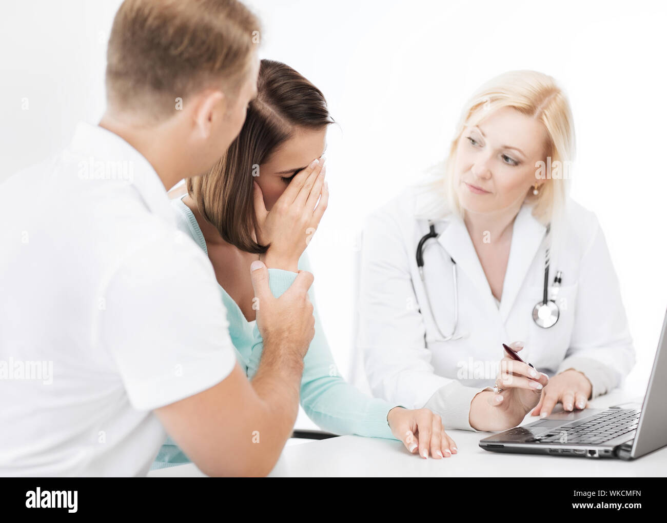 Woman looking laptop doctor hi-res stock photography and images - Alamy