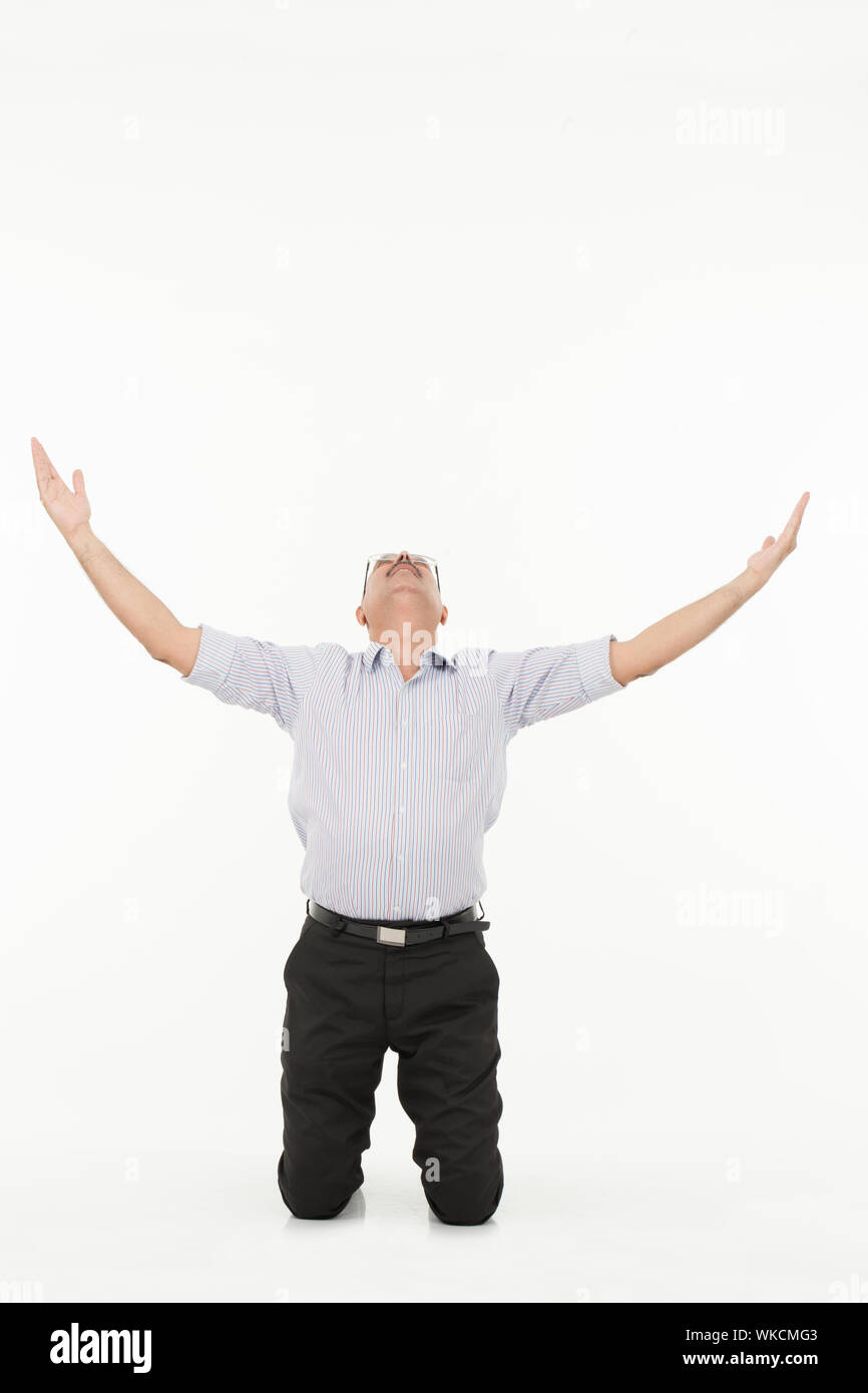 Arms raised kneeling hires stock photography and images Alamy