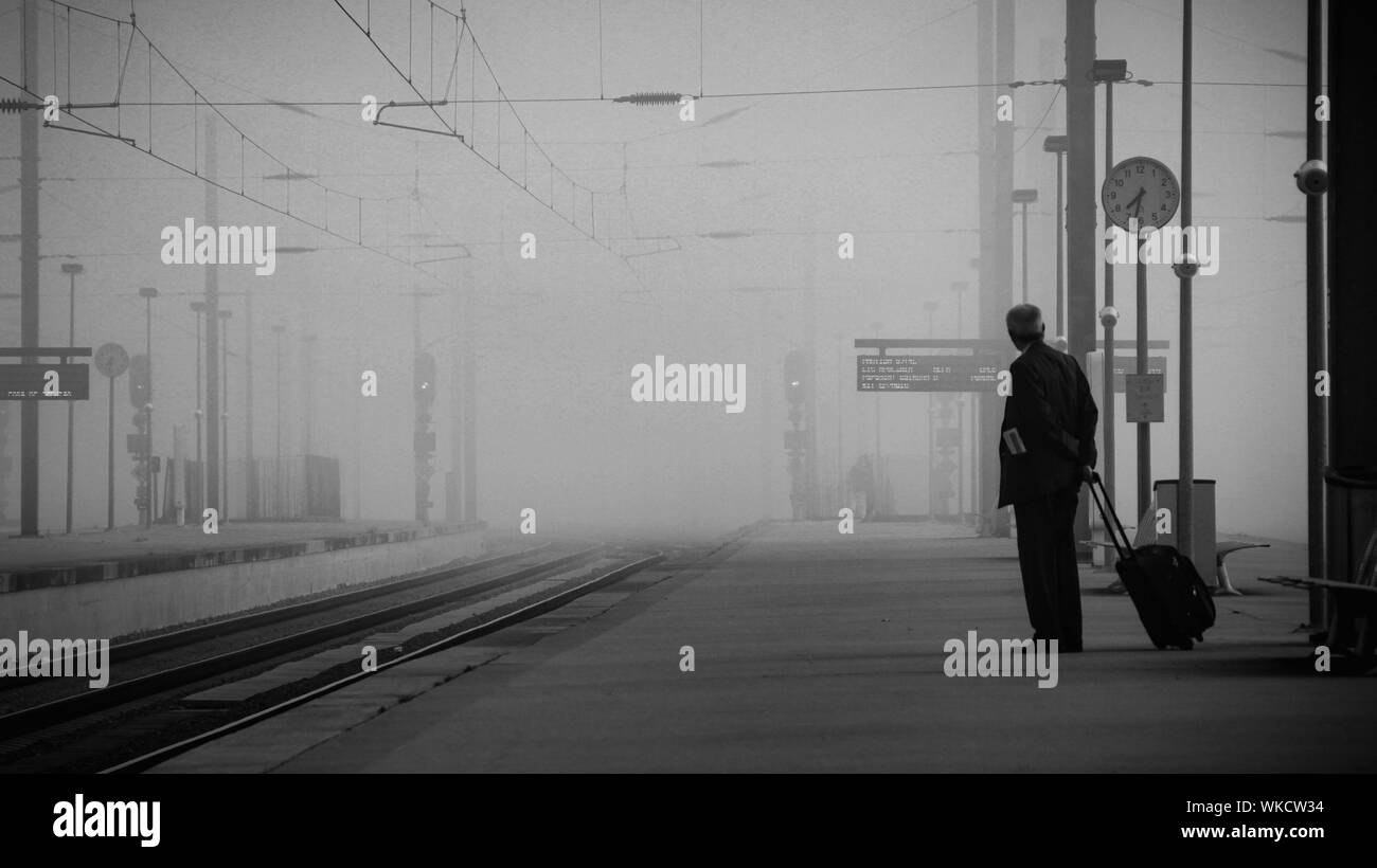 People waiting for train on platform Black and White Stock Photos ...