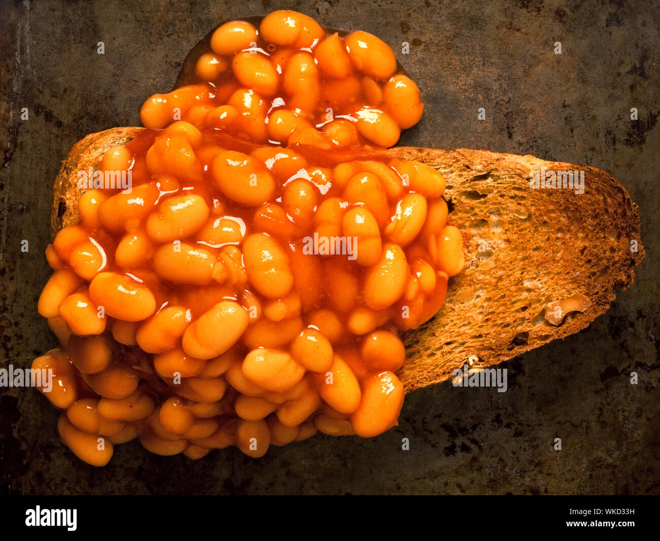 close up of rustic baked beans on toast Stock Photo Alamy