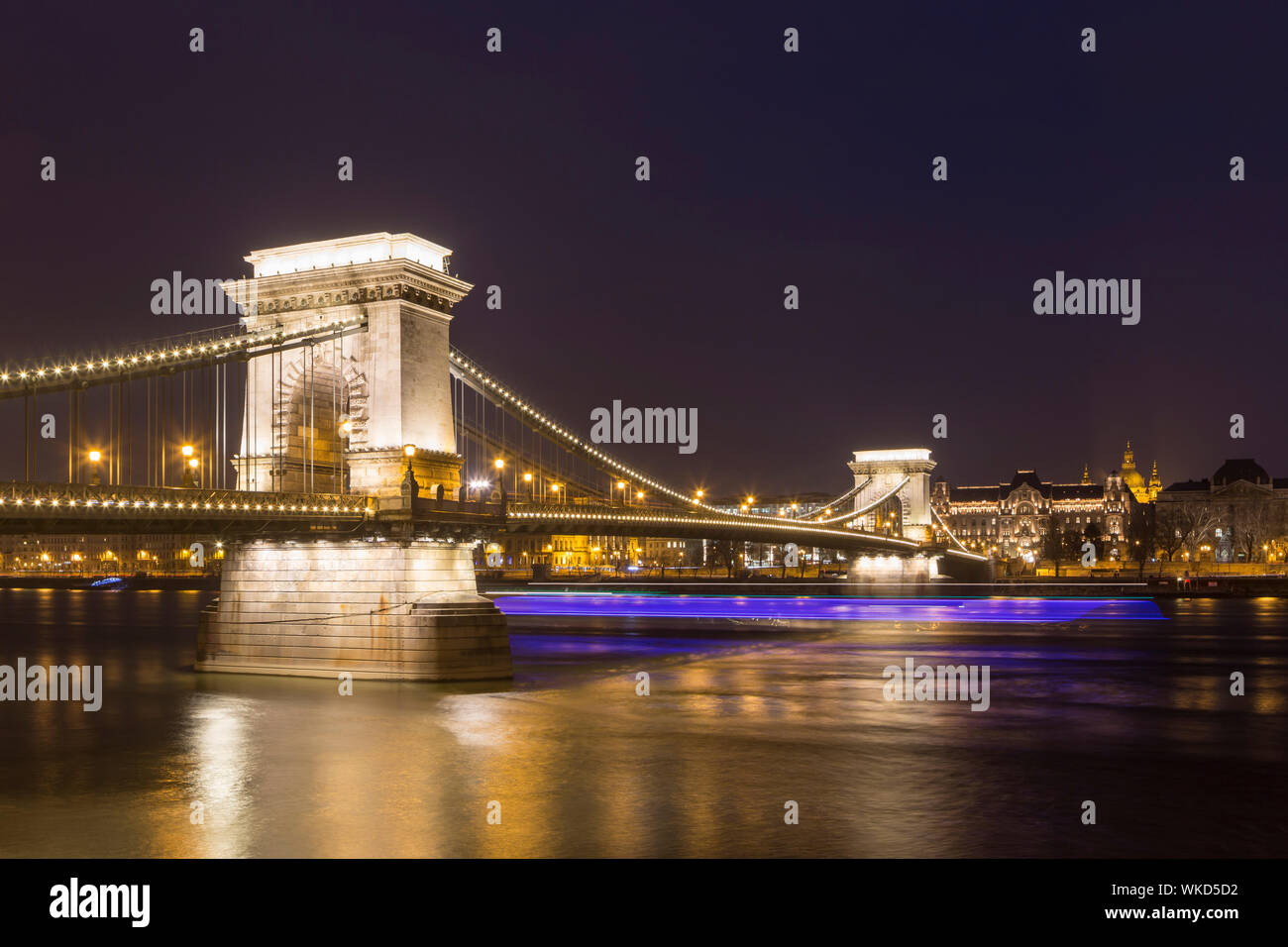 The Szechenyi Chain Bridge in Budapest, Hungary. Spanning the river Danube between Buda and Pest, the chain bridge dates from the late 19th century. Stock Photo