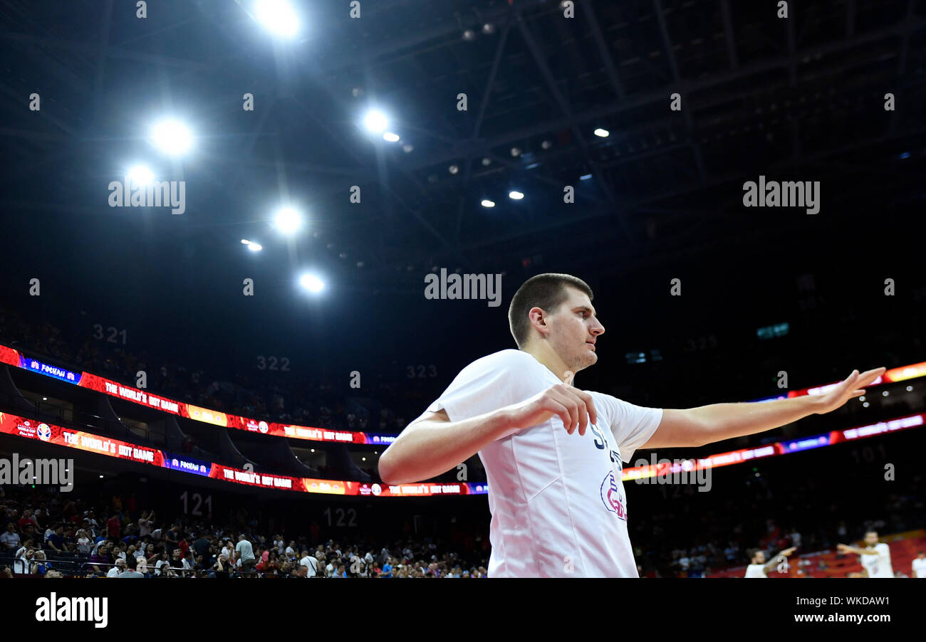 (190904) -- FOSHAN, Sept. 4, 2019 (Xinhua) -- Nikola Jokic of Serbia warms up before the group D match between Italy and Serbia at the 2019 FIBA World Cup in Foshan, south China's Guangdong Province, Sept. 4, 2019. (Xinhua/Huang Zongzhi) Stock Photo