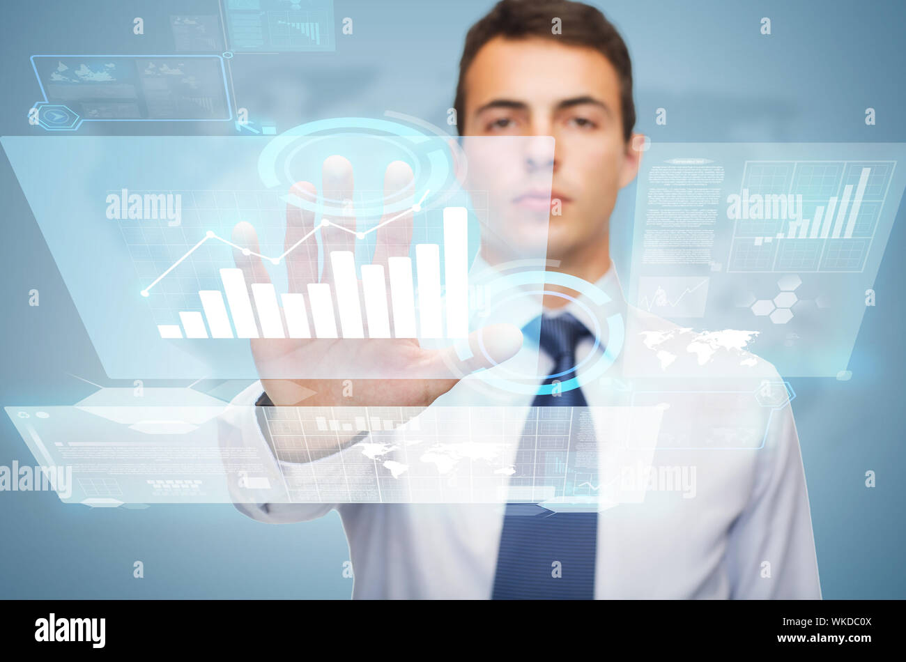 attractive buisnessman working with virtual screen Stock Photo