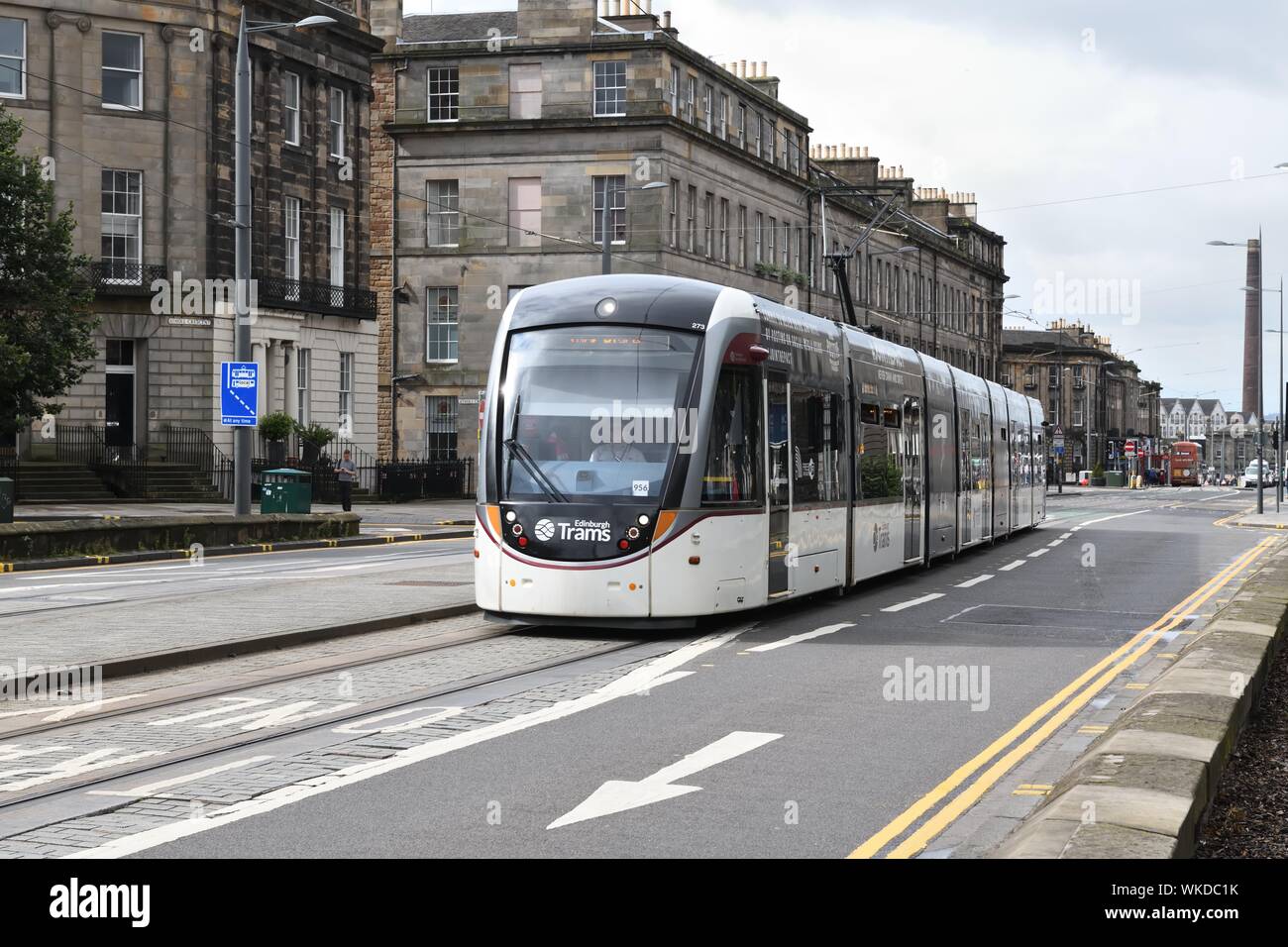 An Edinburgh Tram approaches the Atholl Crescent stop in Edinburgh's