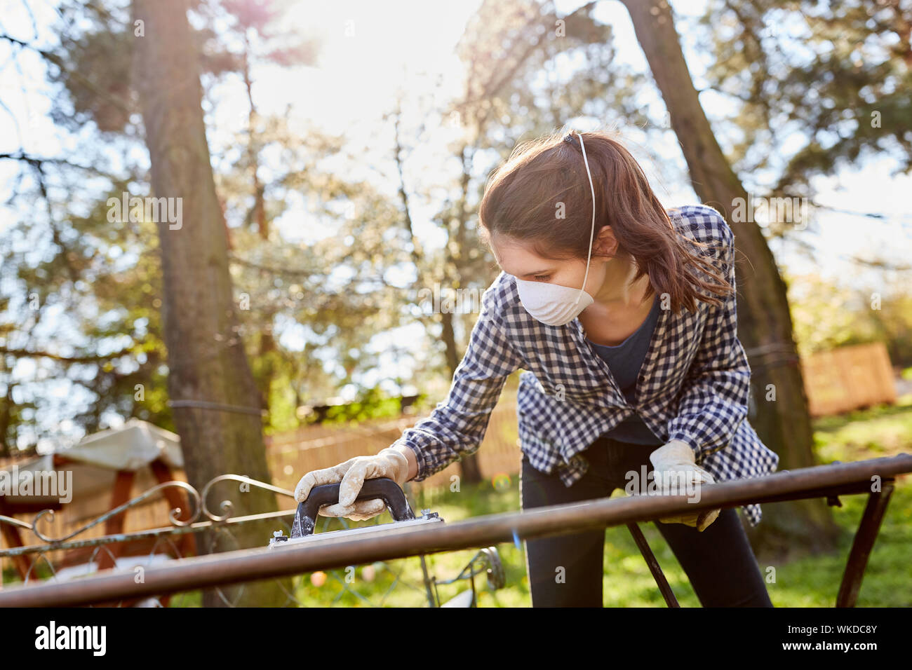 Young woman respirator table hi-res stock photography and images - Alamy