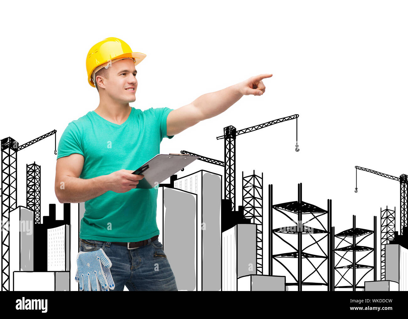 smiling man in helmet with clipboard Stock Photo