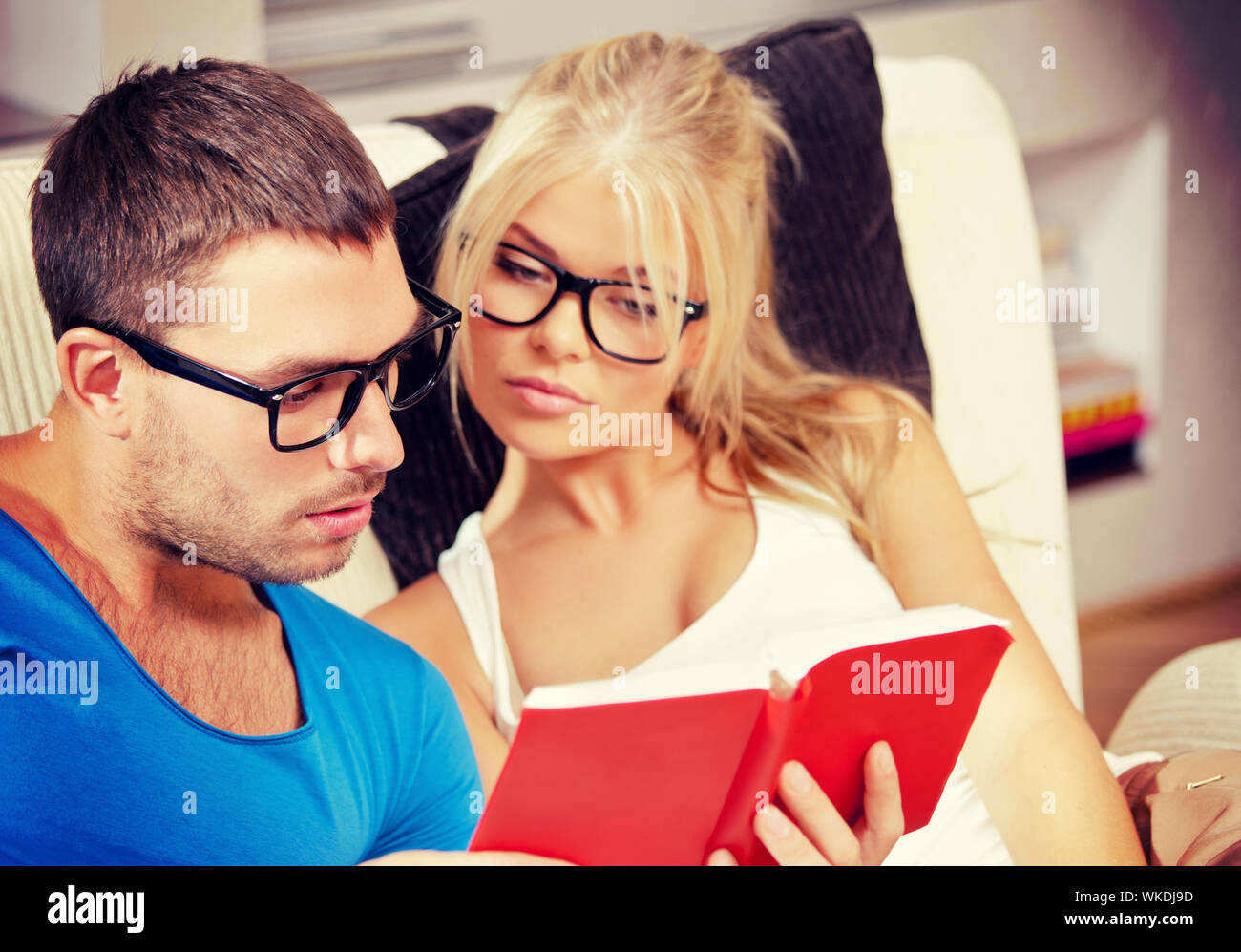couple at home with book Stock Photo