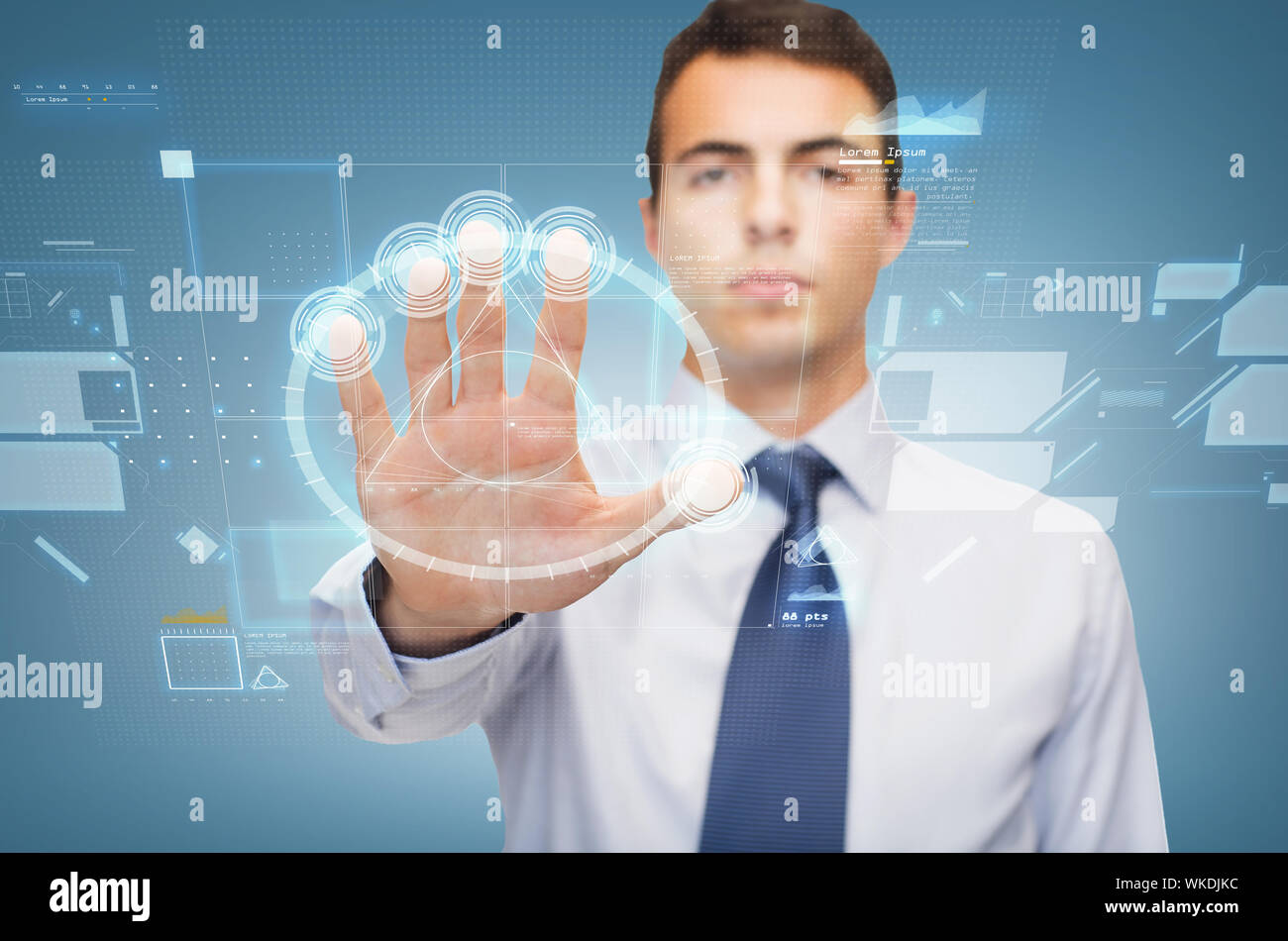 attractive buisnessman working with virtual sceen Stock Photo