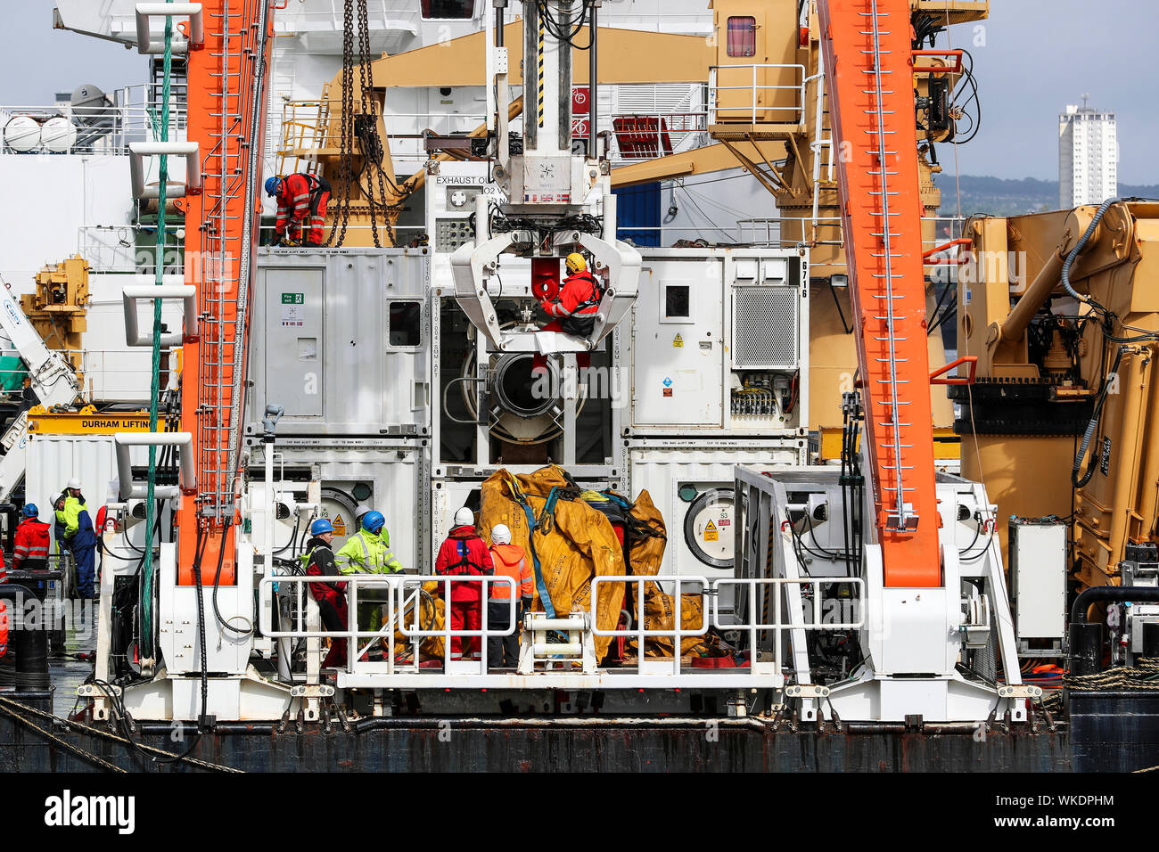 Glasgow, UK. 4th September 2019. The Faslane based NATO Submarine Rescue System (NSRS) was preparing to set sail from Glasgow's King George V Dock to take part in Exercise Golden Arrow on the Firth of Clyde with the teams who operate it the new unique rescue system, jointly owned by UK, France and Norway. The operating teams include Commander CHRIS BALDWIN (Royal Navy) Commander Espin ENGEBRETSEN (Norwegian Navy) and OLIVIA KINGHORN, aged 26, Project Engineer who supervised as the submersible, capable of diving down to 610 metres. Credit: Findlay/Alamy Live News Stock Photo