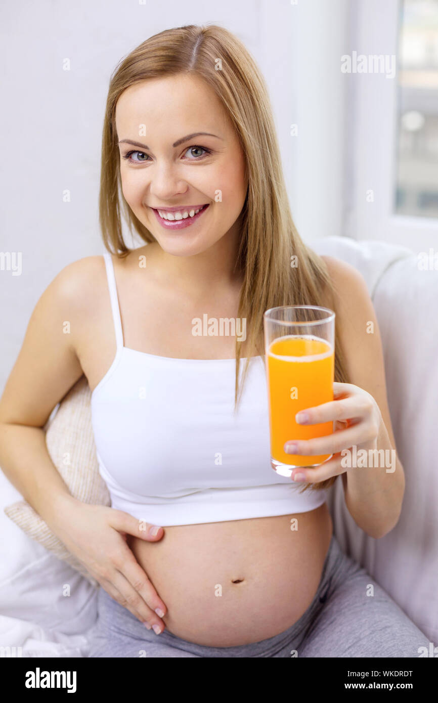 Pregnant woman drinking orange juice hi res stock photography and images Page 3 Alamy