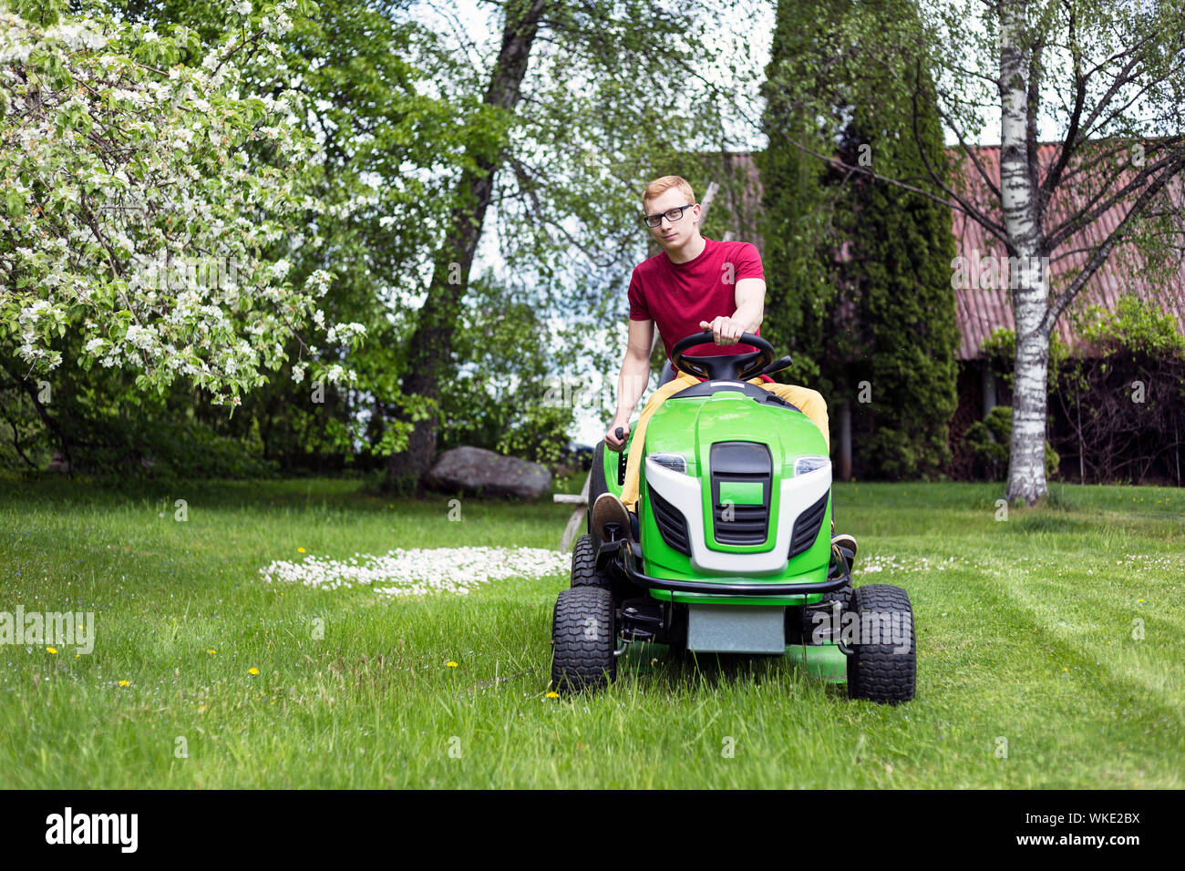 Grass with riding lawn mower hi-res stock photography and images - Alamy