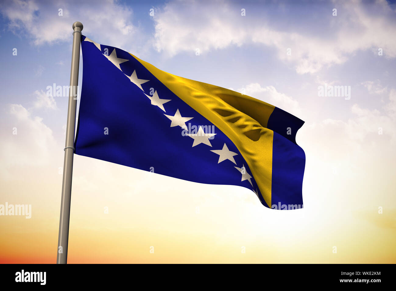 Bosnia national flag against beautiful orange and blue sky Stock Photo ...