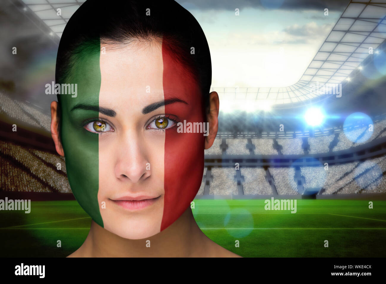 Composite image of beautiful italy fan in face paint against vast football  stadium with fans in white Stock Photo - Alamy