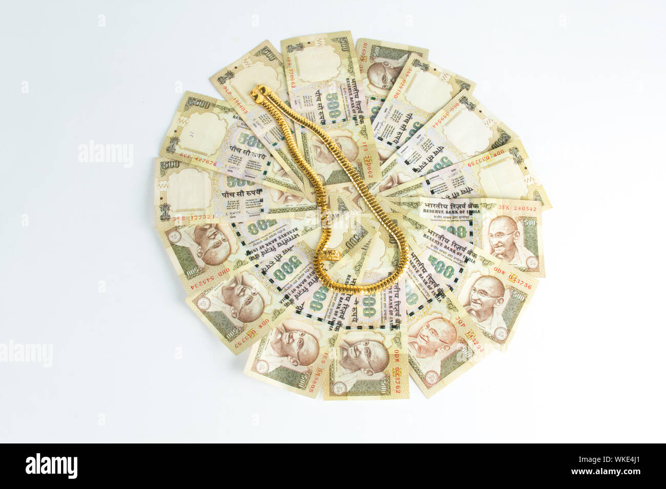 chain and ring on banknotes representing gold Loan concept Stock Photo ...