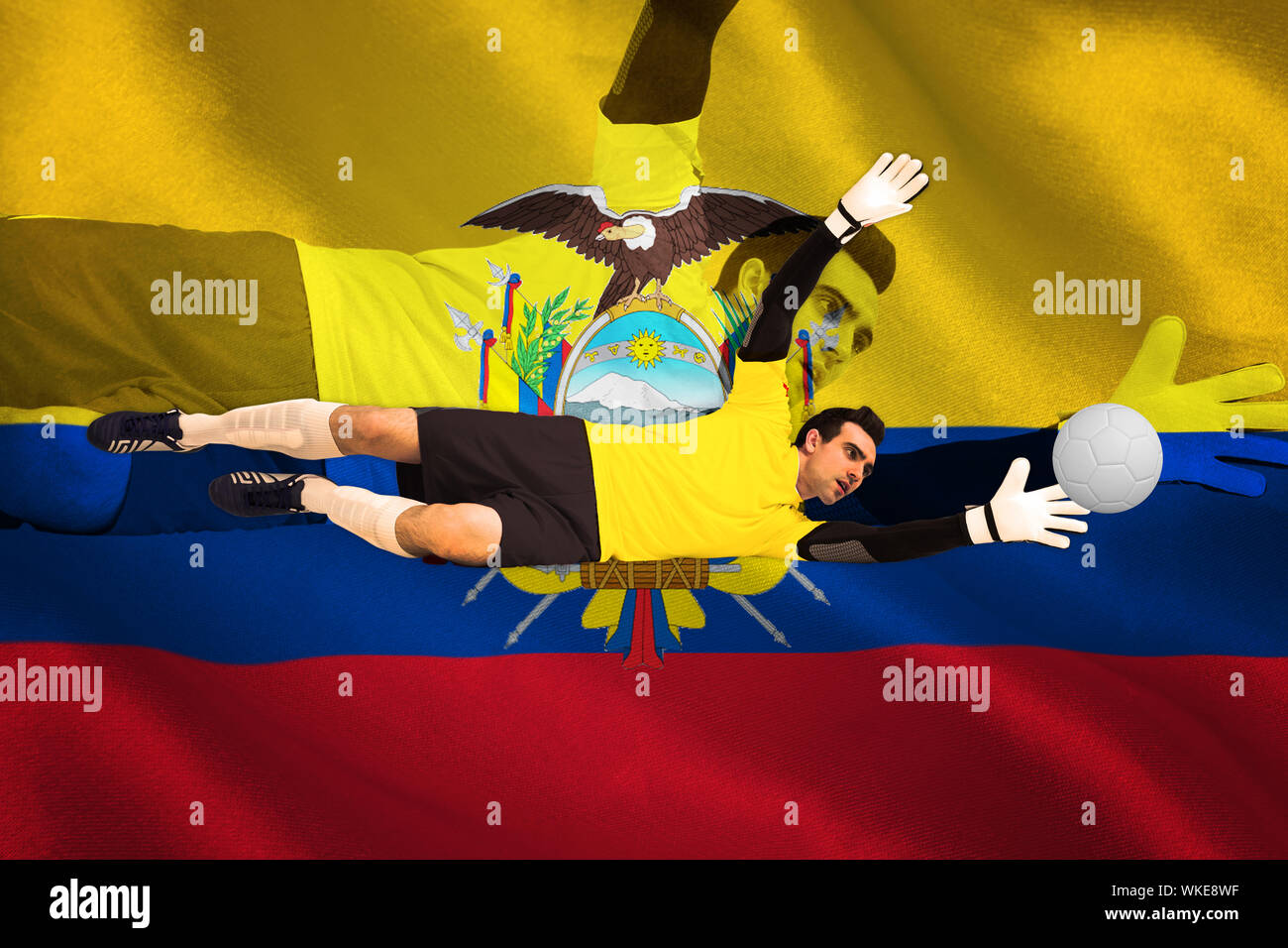 Goalkeeper in yellow making a save against digitally generated ecuador national flag Stock Photo