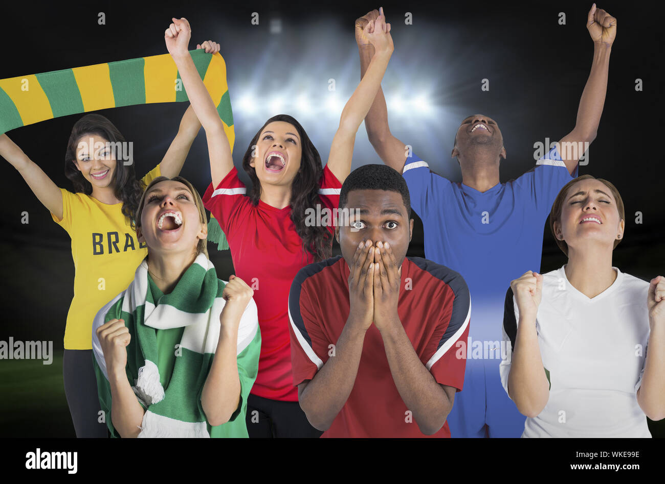 Composite image of various football fans against vast football stadium