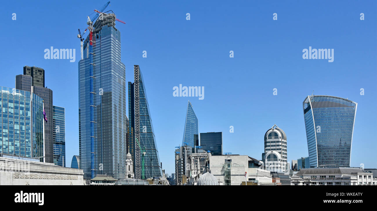 City of London cityscape skyline at 22 Bishopsgate landmark skyscraper construction site & completed modern skyscraper office building landmarks UK Stock Photo