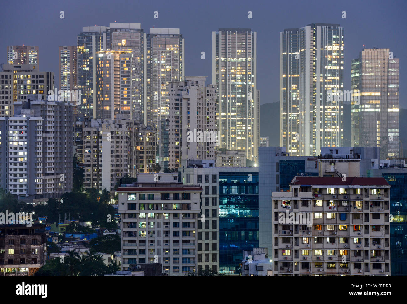 INDIA, Mumbai, skyscraper in suburb Goregoan during dusk, blue hour