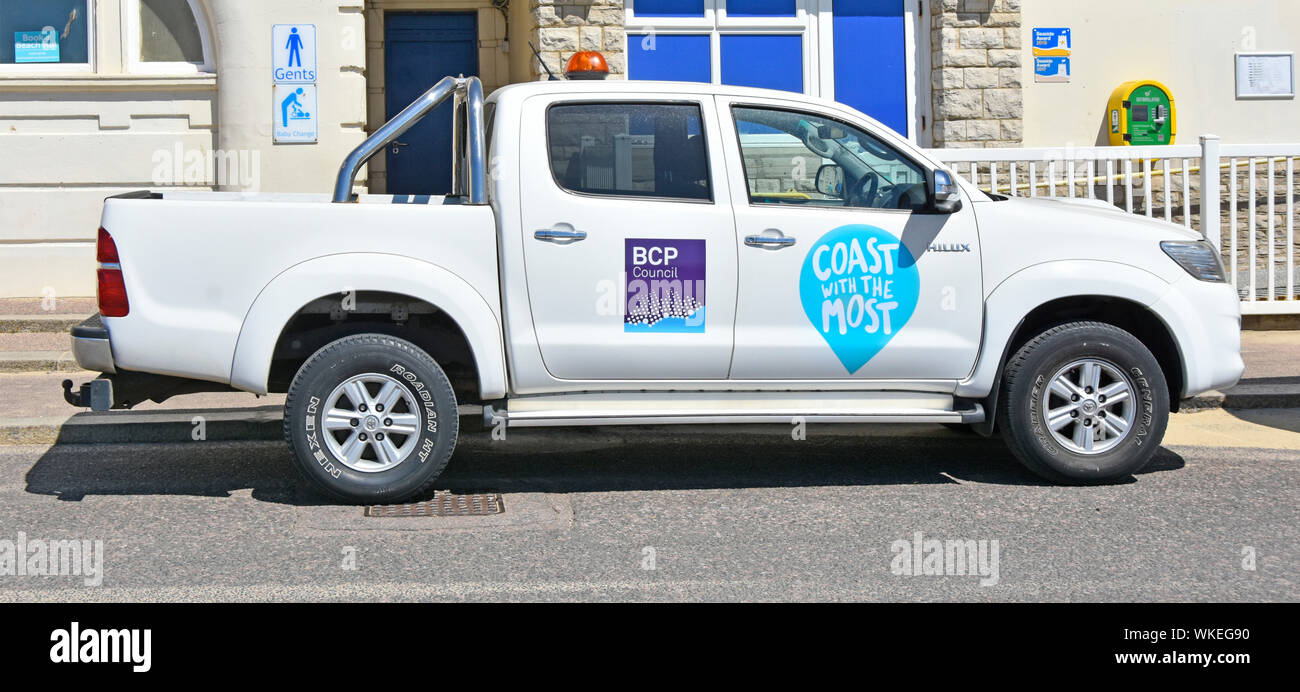 Bournemouth Christchurch & Poole council beach vehicle with ‘coast with the most’ slogan parked at BCP seafront management offices Dorset England UK Stock Photo