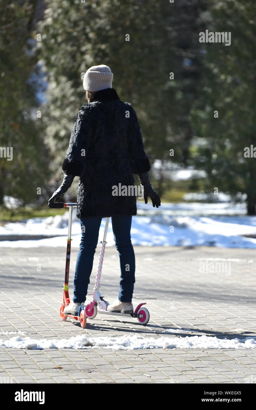 Woman scooters hires stock photography and images Alamy