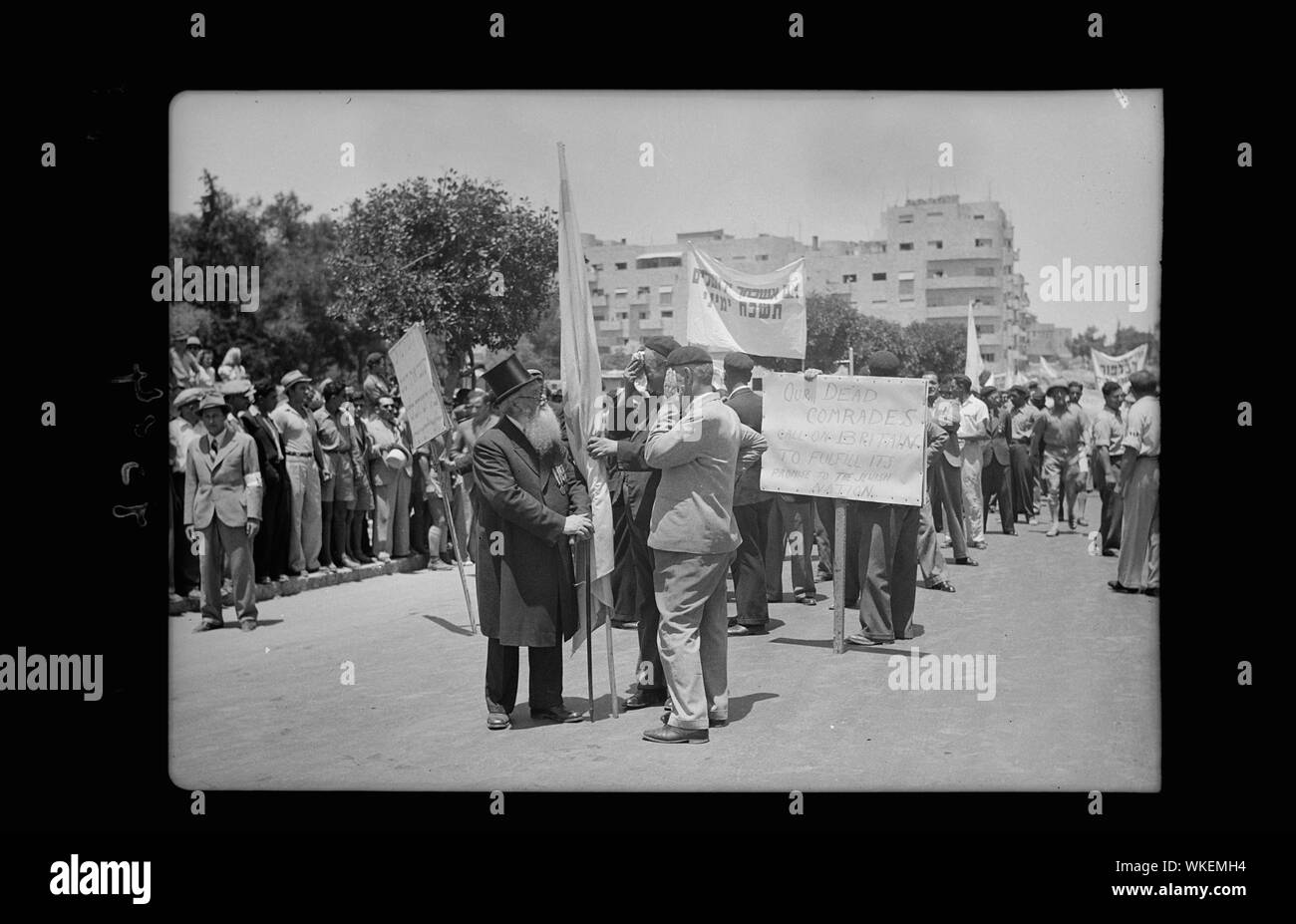 Jewish protest demonstrations against Palestine White Paper, May 18, 1939. Great War legionaries with their veteran chaplain parading on King George Ave. carrying appropriate slogans Jerusalem Stock Photo